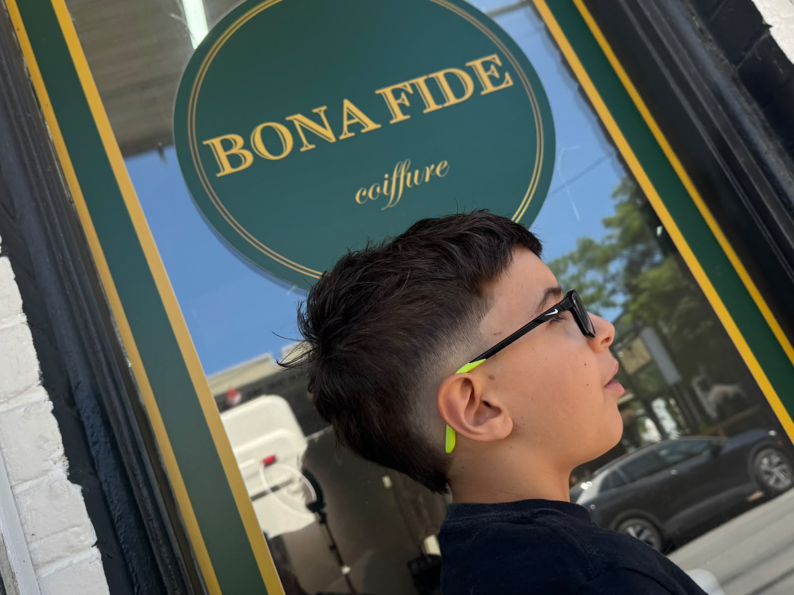Mullet fade profile at Bona Fide window